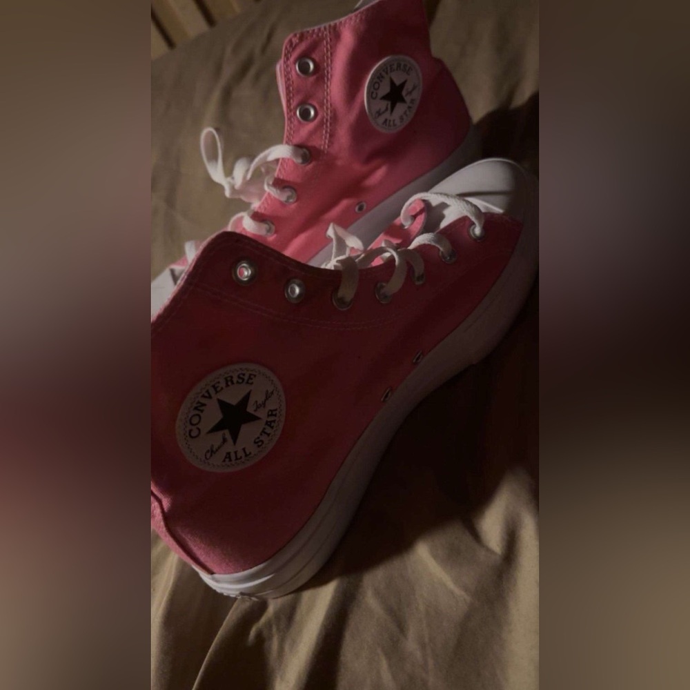 Converse 
Pink-platform high tops
New, had them for awhile and never wore them